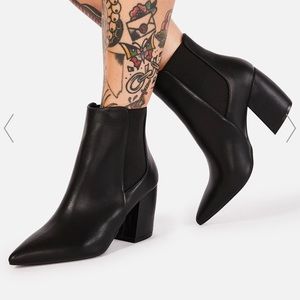 Black pointed toe booties